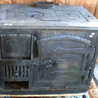 ROBERT GRIEVE Flinders Street Melbourne made Cast Iron STOVE - Door to one side w Fire box to other, all grates & vents, markings to - Sold for $134 - 2013