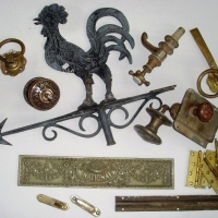 Small box lot vintage metal items inc National cash register drawer front, Cockerel weather vane, tap with porcelain button to top, ornate door knob,  - Sold for $49 - 2013