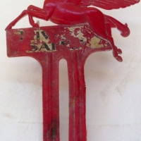 Red plastic Mobil flying horse  Drive Safely number platebumper plaque - Sold for $79 - 2013