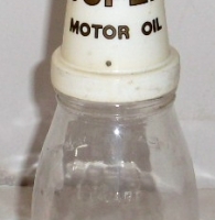 1 quart glass oil bottle with plastic Shell Motor Oil funnel - Sold for $61 - 2013
