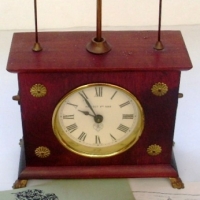 Small lot -  vintage style FLYING PENDULUM Clock made by New Haven Clock Co w paperwork af + pair Turned Brass Classical CANDLE STICKS - Sold for $92 - 2013
