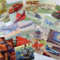 Group lot futuristic embossed cards circa 1930s including 'Fire Fighting by Atomic means', 'Under water fishing by Bathyscaphe (bathysphere)', sub - Sold for $61 - 2013