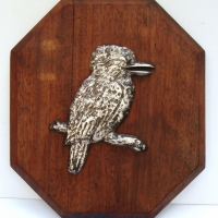 Vintage wooden wall plaque with raised metal Kookaburra - Sold for $67 - 2015