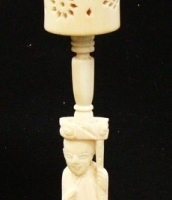 Japanese elephant ivory puzzle ball stand with robed man and revolving barrel - Sold for $49 - 2015