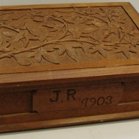 Carved Australian Blackwood box, branch and foliage decoration, signed JR and dated 1903 to back - Sold for $73 - 2015