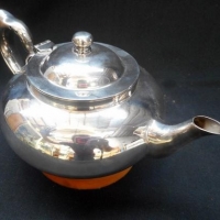 2 items - Vintage silver plated Robur Perfect Tea Pot with infuser insert  &Huon pine trivet - Sold for $98 - 2016