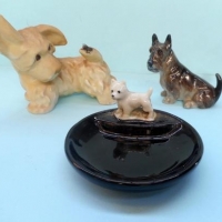 3 x items - Royal Doulton seated Scottish Terrier (K18), Wade Whimtray with white dog & comical ceramic dog with fly on tail - Sold for $27 - 2016