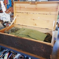 Brown wooden trunk & contents incl,  Vietnam era Australian army uniform items - Sold for $49 - 2016