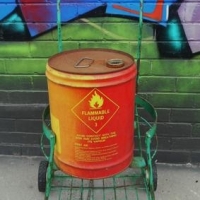 Vintage Garage green metal oil barrel & bottle stand - Sold for $24 - 2016