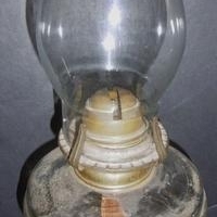Vintage glass kerosene lamp with chimney and cast base - Sold for $61 - 2016