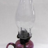 Vintage glass kerosene lamp with purple base with handle and clear glass chimney - Sold for $27 - 2016