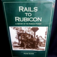 Hardcover book 'Rails to Rubicon' by Peter Evans - Sold for $55 - 2016