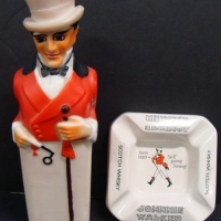 2 x vintage Johnnie Walker items incl James Green & Nephew ashtray and milk glass figural decanter - Sold for $55 - 2016