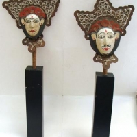2 x Oriental sculptural wooden masks on metal stands with hand painted detailing & metal coin decoration - Sold for $25 - 2016