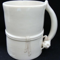 (a) Antique Chinese Dehua blanc de chine cylinder shaped mug with finely made dragon handle - applied ribbon banding around body - 9cms H - Sold for $261 - 2016