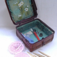 Small cane sewing box with whalebone sewing tools and medal from the Rangoon Needlework Exhibition 1913 - Sold for $25 - 2016
