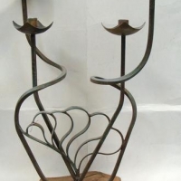 Vintage curled iron table top candle holder on raw timber base - Sold for $25 - 2016