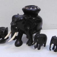 Collection of vintage ebony, carved elephants with ivory tusks, large elephant with porcupine quill decorated ashtray - Sold for $68 - 2016
