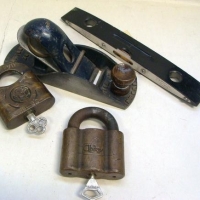 Group lot incl wooden block plane, vintage locks and boat level - Sold for $137 - 2016
