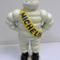 Vintage plaster ware Michelin man with green sash - Sold for $137 - 2016