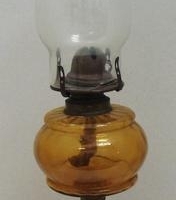 c1890 Art Nouveau cast iron oil lamp with amber glass font - approx 48cm H - glass chimney (af) - Sold for $31 - 2016