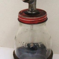 Vintage Imperial Pint glass oil bottle with upper attachment & rubber protective base - reg no 17796 - Sold for $62 - 2016
