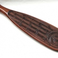 Carved Maori  Patu - Polished timber w intricate carved decoration to one side - Sold for $56 - 2016