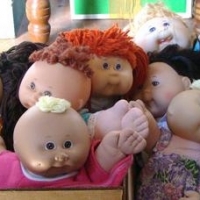 Box assorted Cabbage Patch Dolls and accessories in - 'As New' shoes, babies, boys, girls, etc - Sold for $62 - 2016