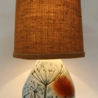 Tremaen Pottery (Newlyn, Cornwall) sculptural ceramic table lamp with impressed decoration and Hessian shade - Sold for $27 - 2016