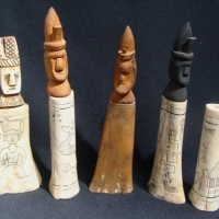 Set carved bone Timorese lime containers with figural head shaped lids - Sold for $43 - 2016