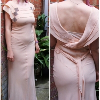1920's pale peach crepesilk long evening gown cut on bias, tie back and square layered collar with beaded detail, low draped back, tip beaded waist ti - Sold for $199 - 2016
