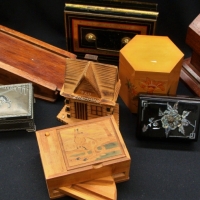 Group lot vintage boxes inc - cigarette dispensers and spelter Alsatian box - Sold for $25 - 2016