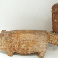 1960s  PNG wooden pig totem figure with human figure - approx L 31cm - Sold for $37 - 2016