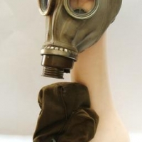 Post WW2 Russian rubber gas mask with cloth cover - Sold for $31 - 2016