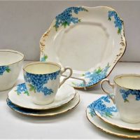 Group of Pretty blue floral china by Paladin incl 4 Trios, Sandwich plate and bowl - Sold for $62 - 2018