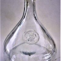 Group of glass incl Vintage Holmegaard decanter with Viking seal and wide base and red lamp glass - Sold for $43 - 2018