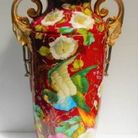 Large Ornate heavily gilded two handled Continental pottery Vase with Parrot and floral decoration AF with restorations sighted - Sold for $75 - 2018