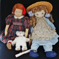 2 x collectable 'Pauline Bjonness-Jacobsen' dolls inc - Mint boxed porcelain doll and play used rag doll - Sold for $25 - 2016