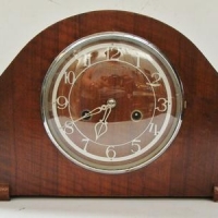 Art Deco mantle clock in walnut veneer case - Sold for $25 - 2016