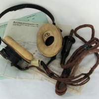 Lot 186 - 1940s Australia pilot's headphones by ST & C Sydney - Sold for $50
