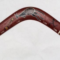 Lot 277 - Vintage BILL ONUS Boomerang - HPainted Motifs to top, faint mark to underside - Sold for $47