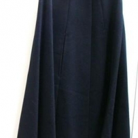 Lot 61 - Ladies vintage 'ANTMAN' of Melbourne black woolen cape with red lining - size 10 - Sold for $68