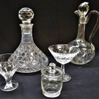 Group lot - cut crystal including large ship's decanter, Stuart crystal honey pot and Waterford crystal cocktail glass - Sold for $50 - 2019