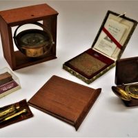 Group lot incl Small boxed binnacle compass, Chinese lodestone compass, fluid cigarette lighter and Oak from HMS Victory - Sold for $56 - 2019