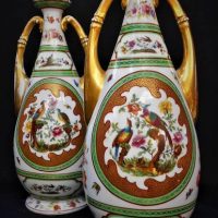 Pair of German Porcelain vases - Classical shapes, Twin Handles to tops, Transfer Bird & Foliage decoration, marks sighted to base, 1 af - approx 35cm - Sold for $35 - 2019