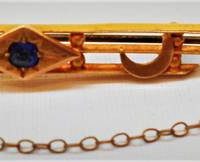 c1900 9ct ygold bar brooch set with bright blue sapphire - Sold for $68 - 2019