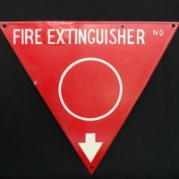Vintage red triangle enameled 'Fire Extinguisher' sign - Sold for $37