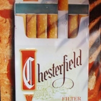 Vintage embossed tin advertising sign - 'Chesterfield Cigarettes' - approx 59x39cm - Sold for $81