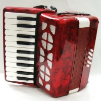 Childs red accordion with straps - Sold for $93