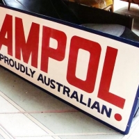 Lot 101 - Hand painted 'Ampol proudly Australian' metal advertising sign - Sold for $93